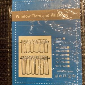 Black Window valance. 60 inches wide and 15 inches long. New with tags.